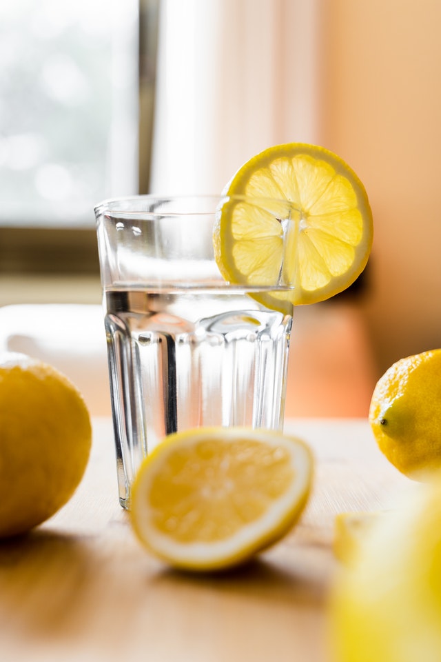 A glass of lemon detox water